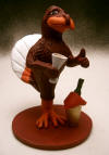 Grooms cake topper of his favorite football team mascot