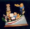 Clay caricature of the 2 of them in the romantic Venetian Gondola, what a great gift souvenier of a specail occasion.Let the trumpets sound!!