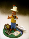 Custom made birthday gift for a bird watcher! ...with his boat, destination strewn suitcase and friend on his safari hat!