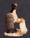 Personalized wedding cake topper of Mtn. climbers scaling Mt.Love