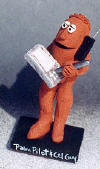 Clay Figurine of man with his palm pilot