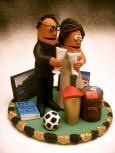A Champagne toast to a custom made wedding cake topper