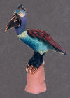 bird sculpture of fired clay, hundreds of handmade feathers