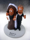 A Wedding Cake Topper can be created incorporating any colored Wedding Gown....
