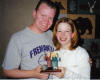 The Wedding Couple posing with their custom made Wedding Cake Topper...They Love it!